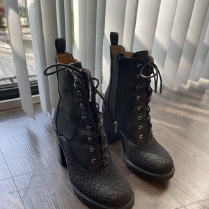 Coach 4 inch stack heel bootie.